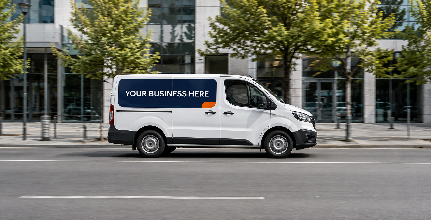 White van driving sideways with magnetic sign